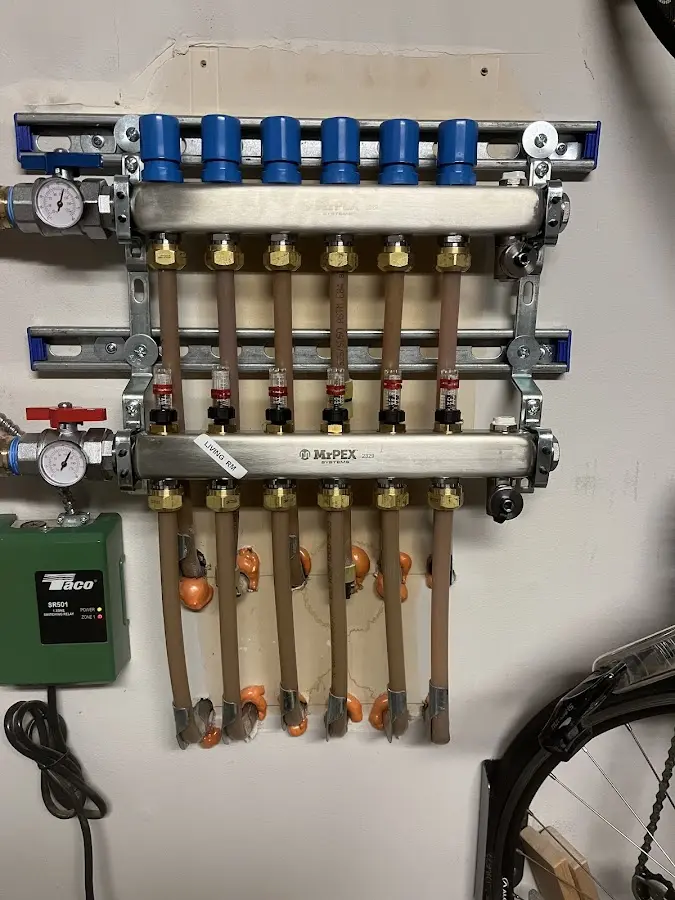 Plumber performing Water Heater Repair at a residential property in Wausau